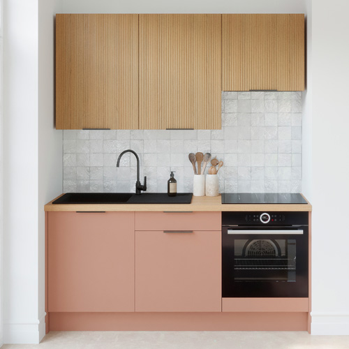 Ensemble de 6 meubles de cuisine - L. 185 cm - abricot et chêne clair cannelé - Luzia Signature
