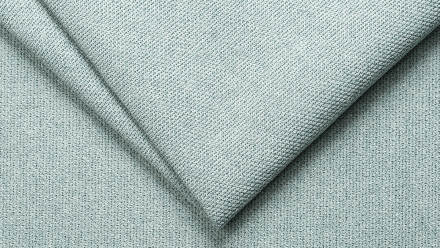 Canapé d'angle convertible réversible 4 places avec coffre de rangement en tissu bleu pastel - Livia New