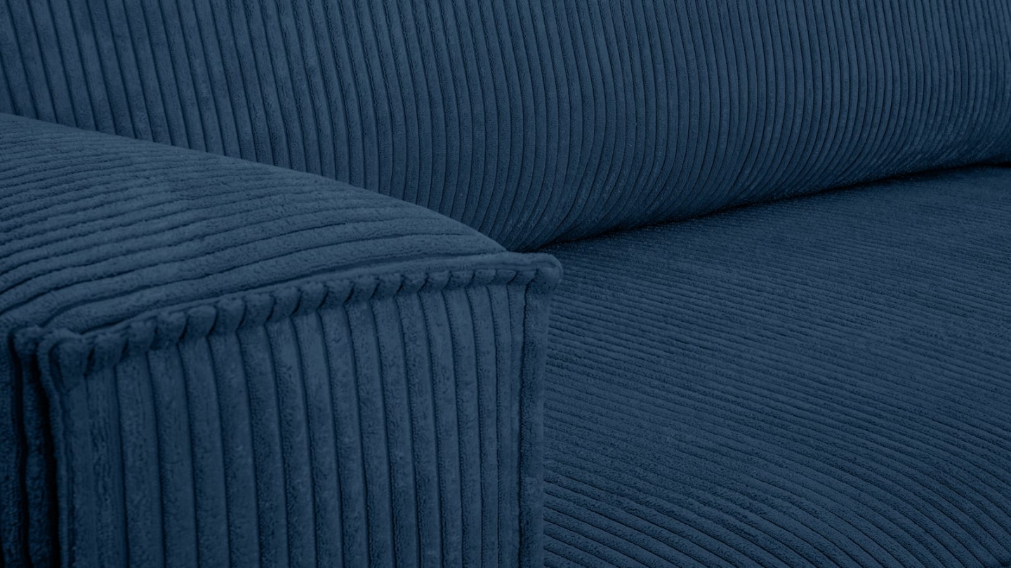 Canapé d'angle convertible réversible 4 places avec coffre de rangement en velours côtelé bleu - Livia Canapé d'angle convertible réversible 4 places avec coffre de rangement en velours côtelé bleu - Livia